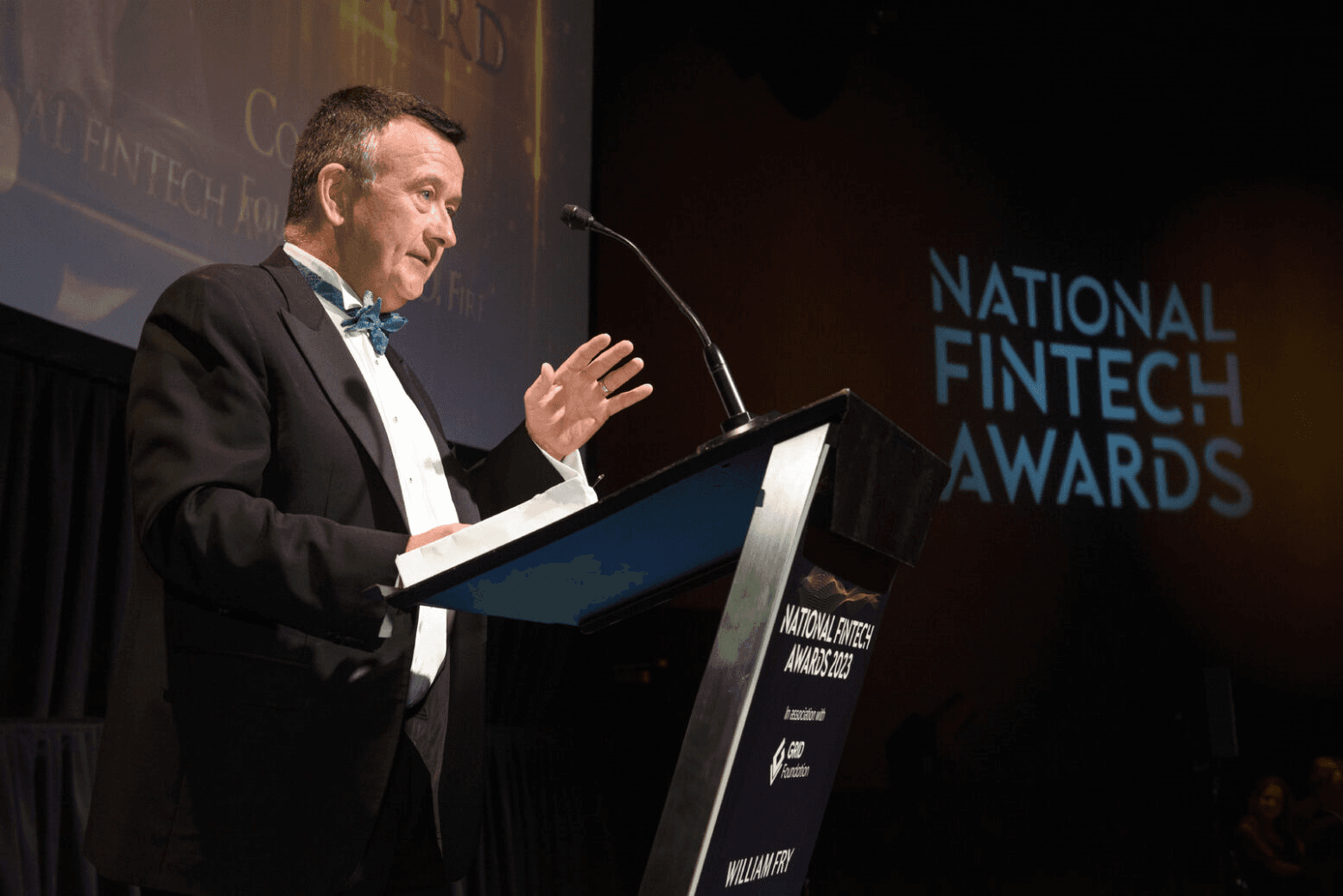 Colm Lyon holding a speech after receiving the Outstanding Achievement Award at the National Fintech Awards